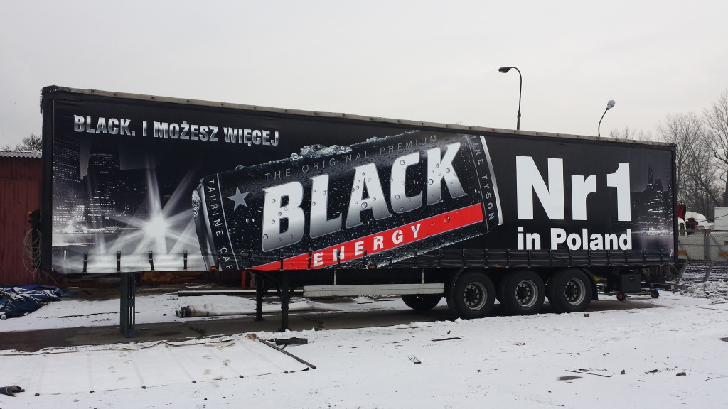 Nadruk na plandece - reklama firmy Black