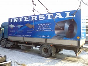 plandeka ciężarówki - reklama Interstal